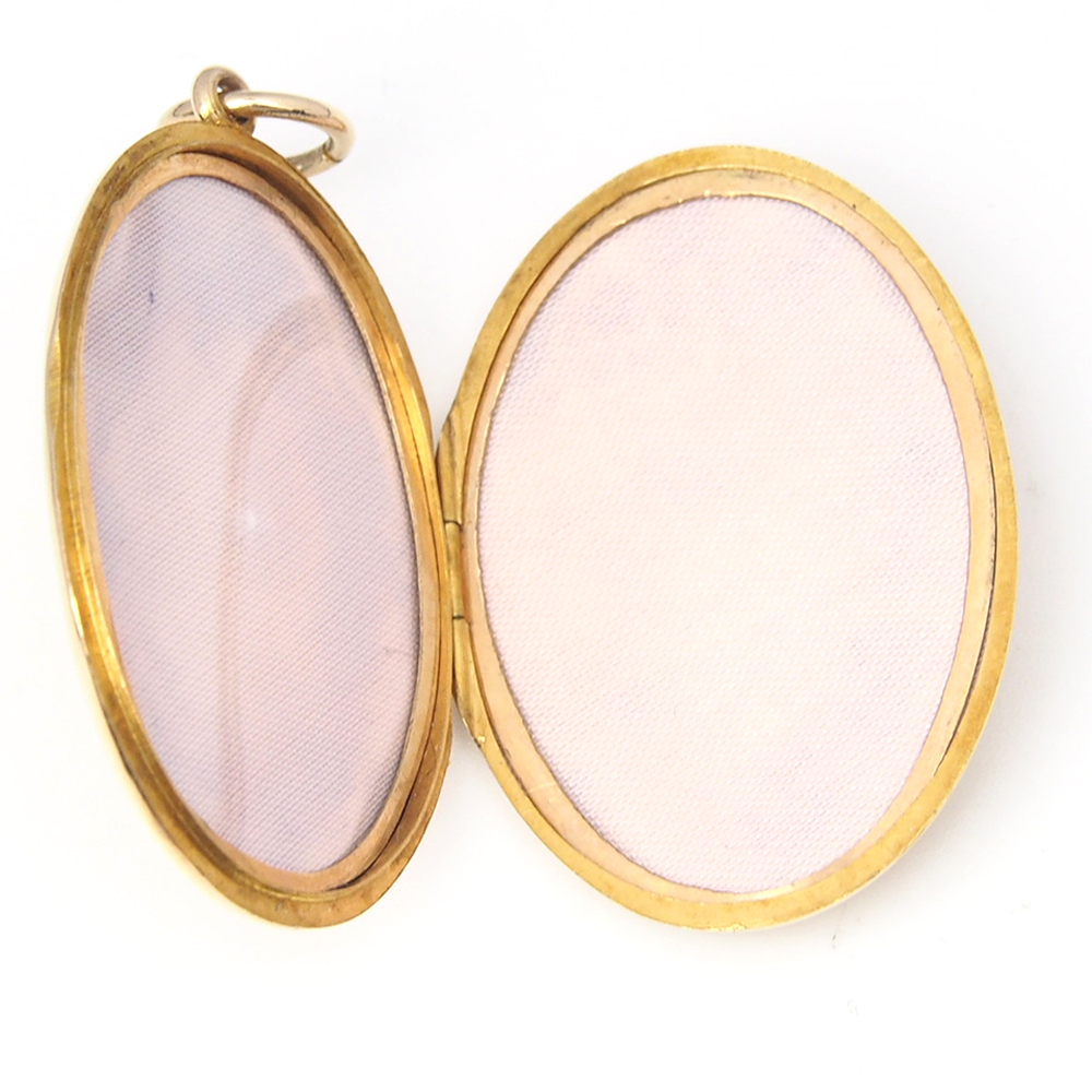 Locket - Edwardian 15ct Gold  Set with a Single Old Cut Diamond
