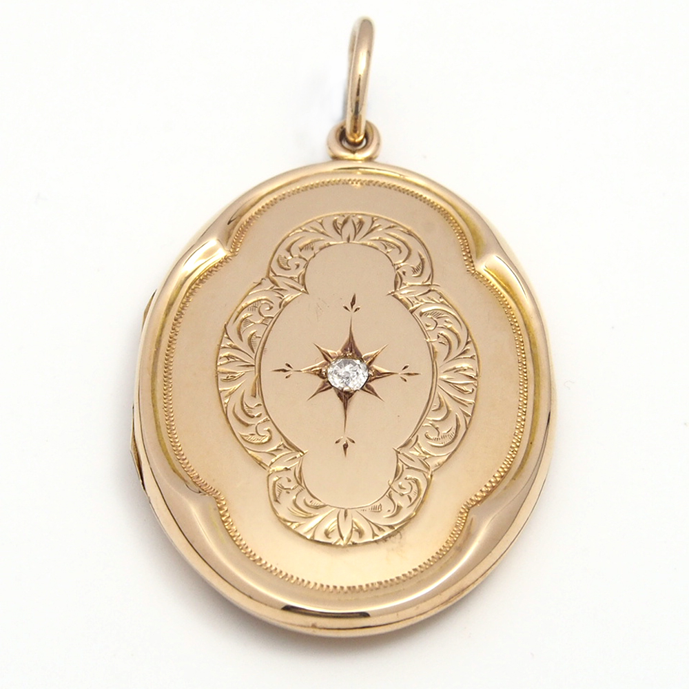 Locket - Edwardian 15ct Gold  Set with a Single Old Cut Diamond