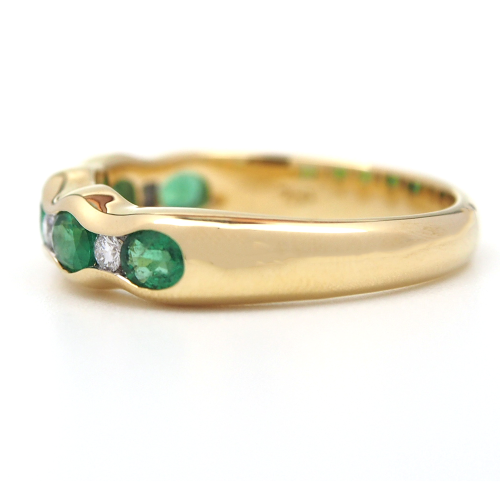 Emerald & Diamond Nine Stone