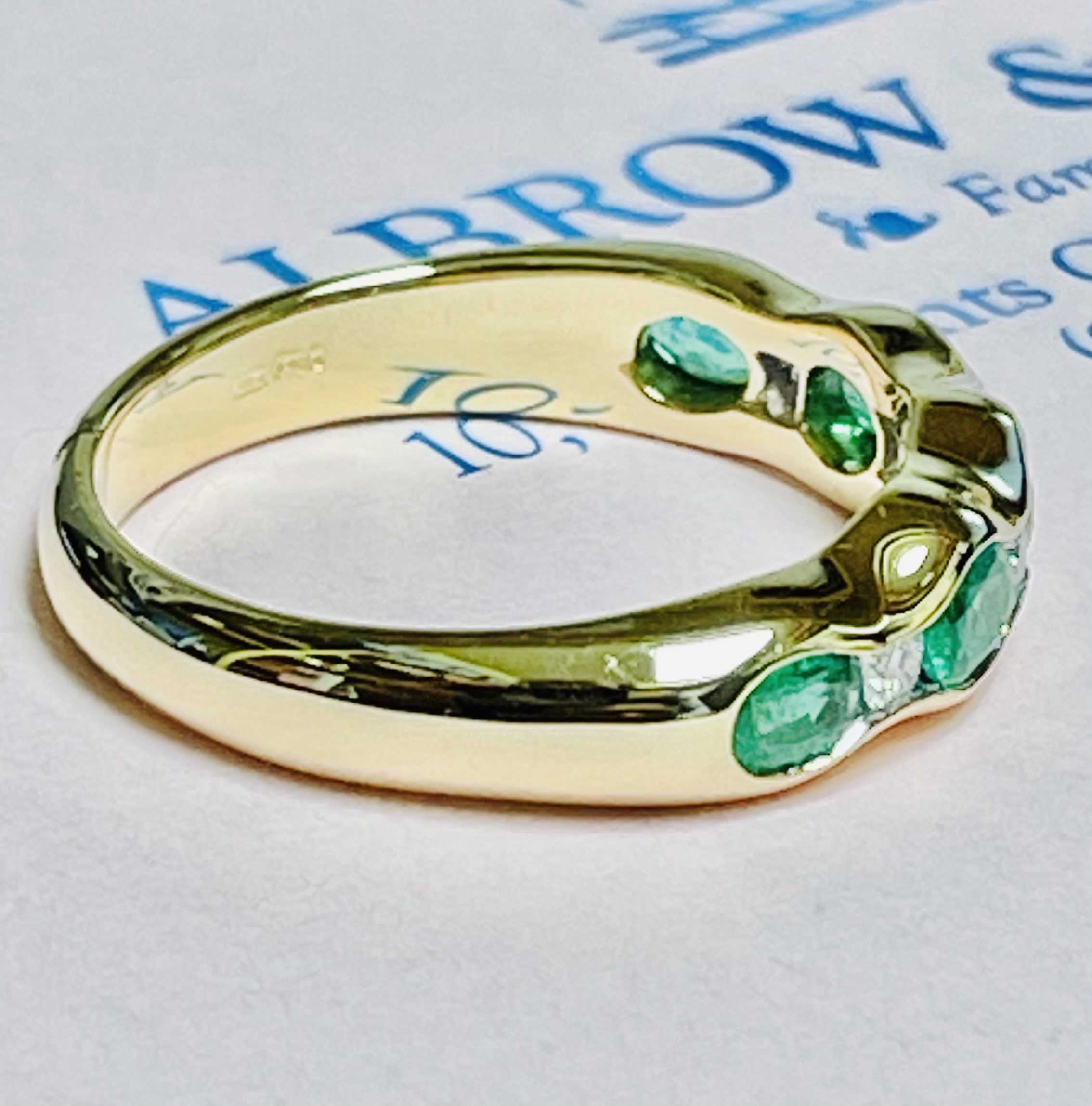 Emerald & Diamond Nine Stone