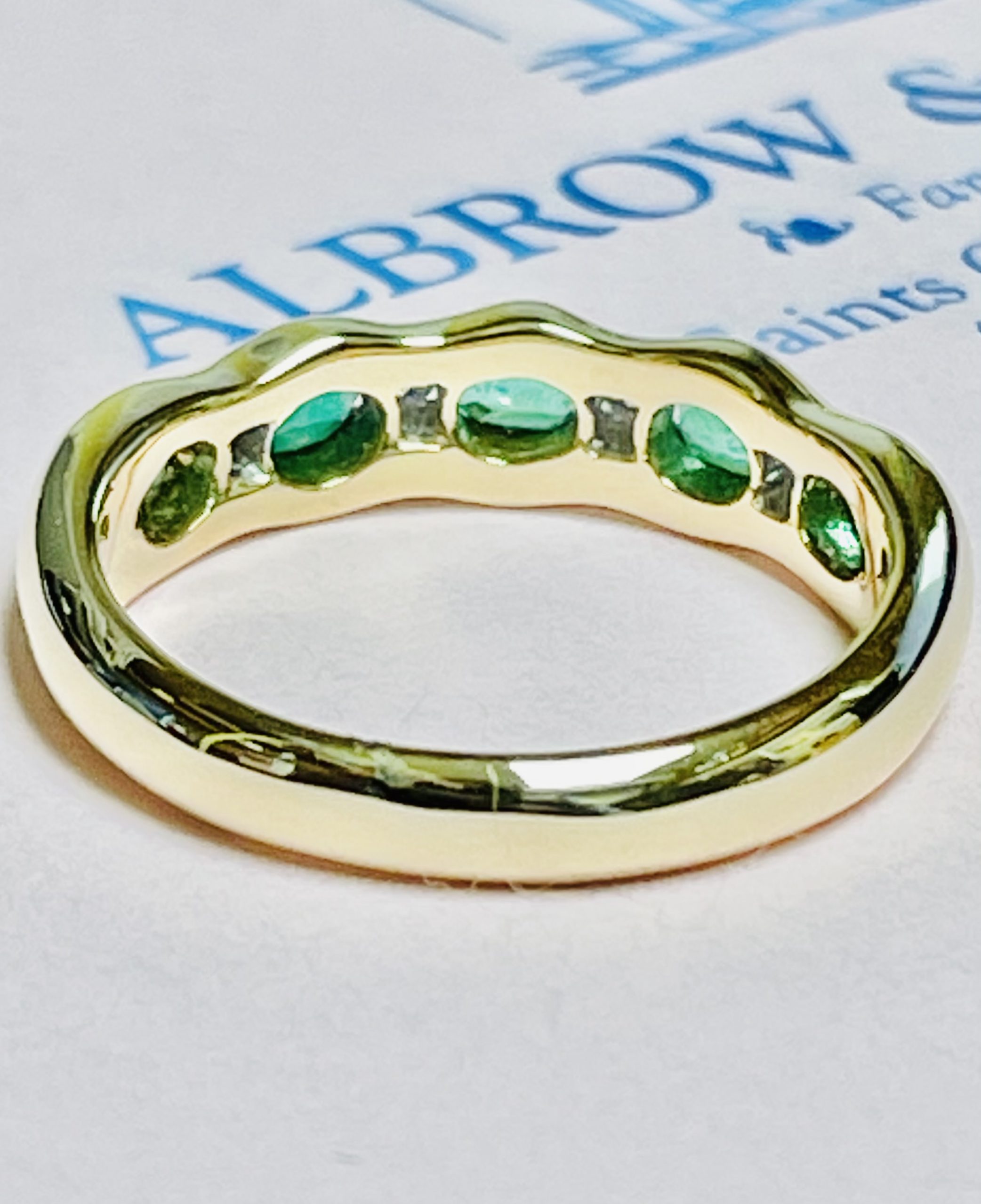 Emerald & Diamond Nine Stone