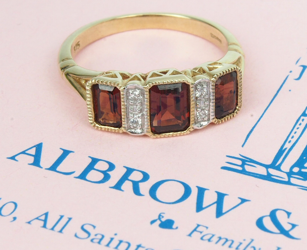 Garnet and Diamond Seven Stone Ring