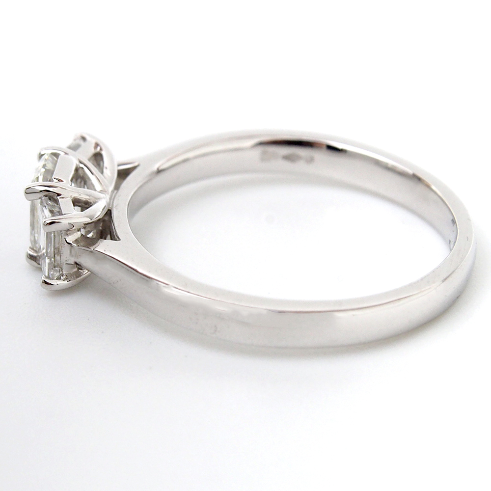 Diamond Emerald Cut Three Stone Ring - Platinum